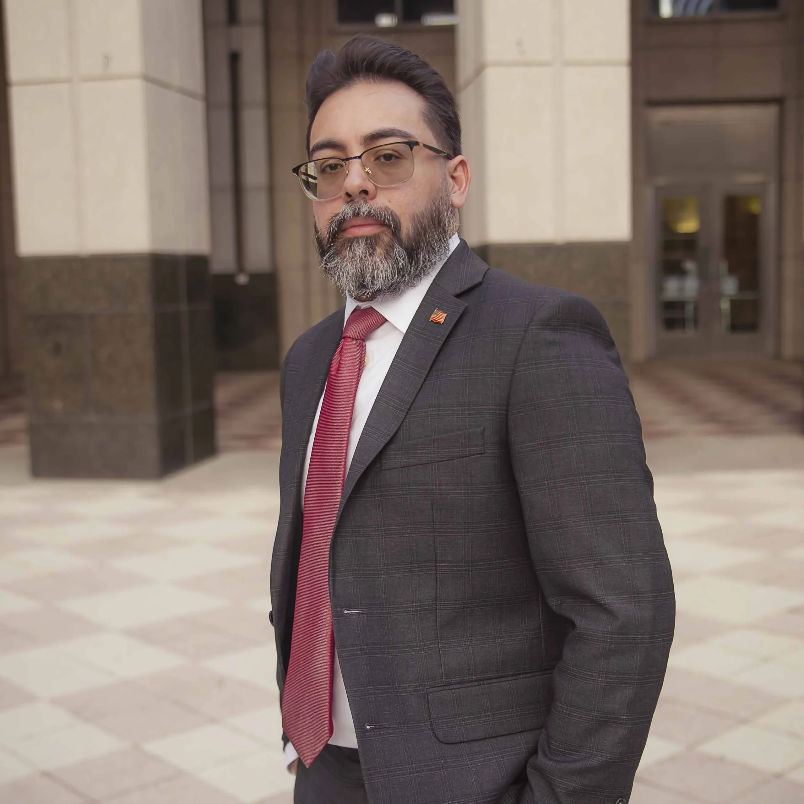 Pedro A. Matos, attorney with The AM Lawyer, P.A. in Orlando, Florida, stands